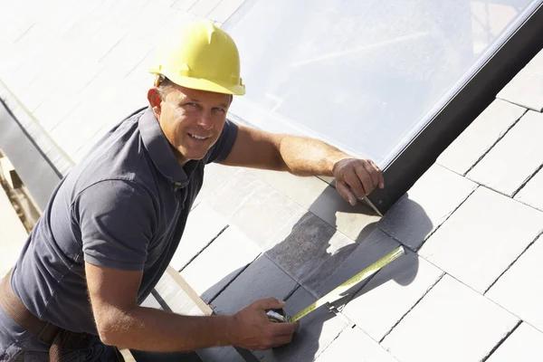 Why Regular Inspections from a Roofing Contractor in Rochester Matter